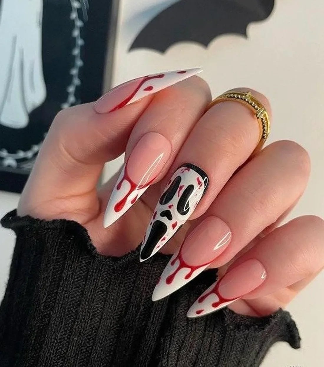 scream-halloween-nails-press-on | Slashed Beauty Halloween nails with a scream design | Trendy Fall Nail Designs You Can Buy as Press-Ons on Etsy | Slashed Beauty