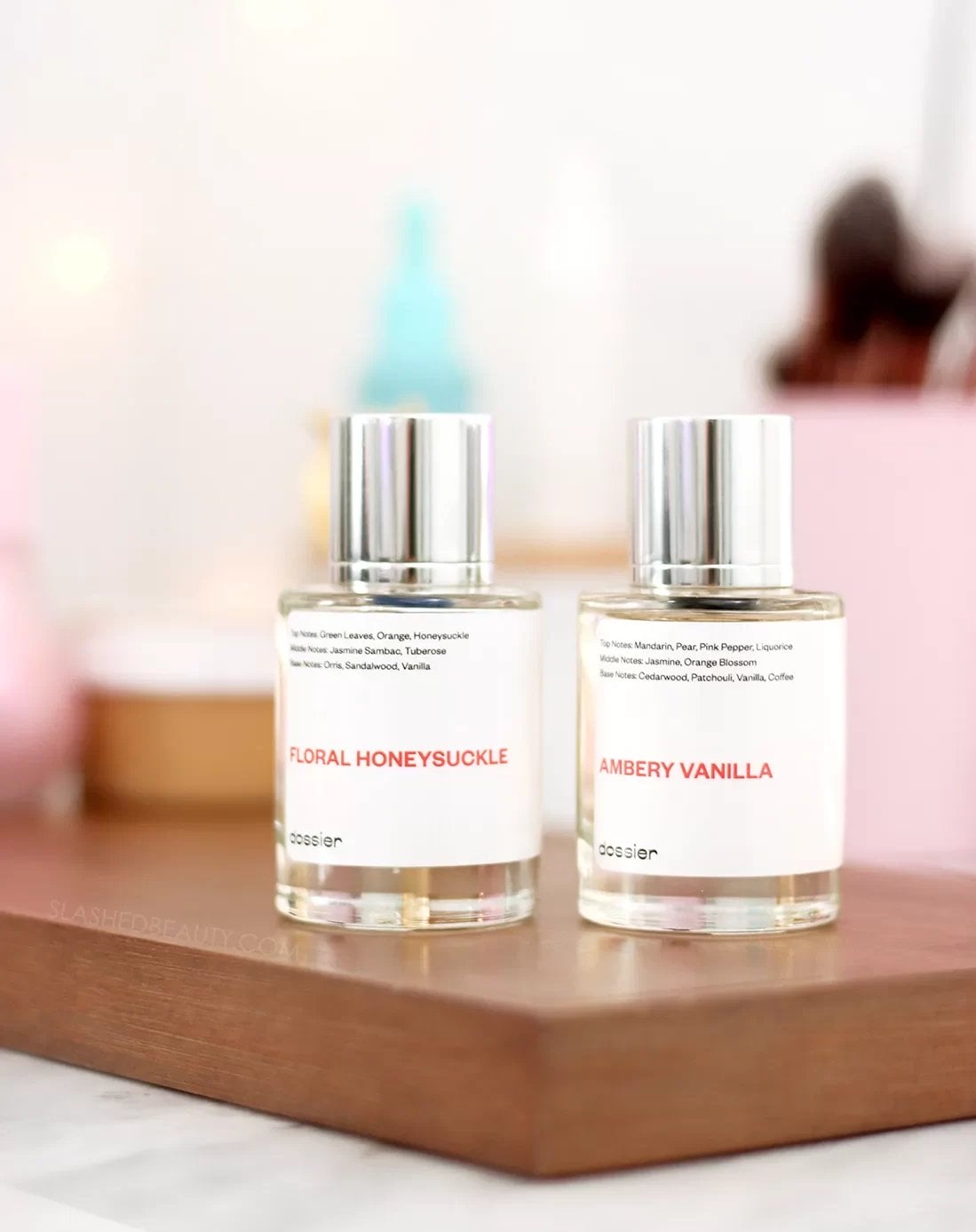 are-dossier-perfumes-good | Slashed Beauty Two bottles of Dossier perfume sitting on a vanity| Dossier Perfume Review | Slashed Beauty