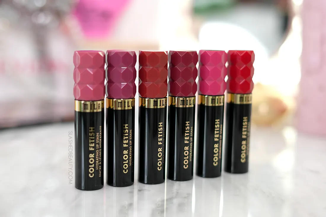 milani-color-fetish-lip-stain-review | Slashed Beauty Milani Color Fetish Lip Stain tubes standing side by side on a vanity | Review & Swatches | Slashed Beauty