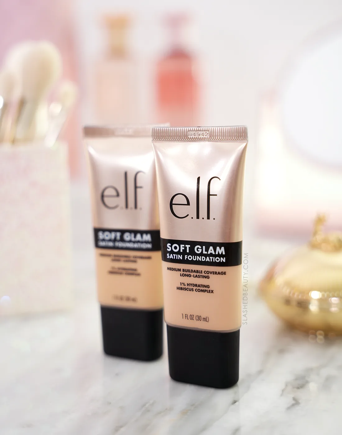 elf-soft-glam-satin-foundation-review-light-neutral | Slashed Beauty Two tubes of e.l.f. Soft Glam Satin Foundation standing side by side on a vanity | e.l.f. Soft Glam Satin Foundation Review | Slashed Beauty
