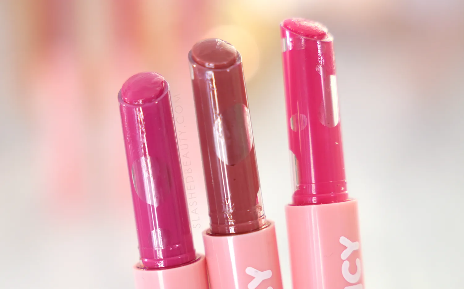 COLOURPOP-so-juicy-air-bubbles | Slashed Beauty Close up of ColourPop So Juicy Gloss Balms, showing large air bubbles in product | ColourPop So Juicy Plumping Gloss Balms Review | Slashed Beauty