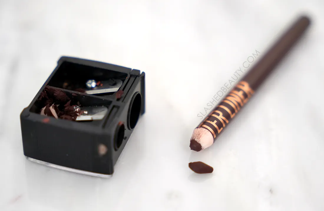 broken-maybelline-lifter-liner-sharpen | Slashed Beauty Maybelline Lifter Liner with a broken tip, lying next to a pencil sharpener with shards of lip liner inside | Sharpening the Maybelline Lifter Liners | Slashed Beauty