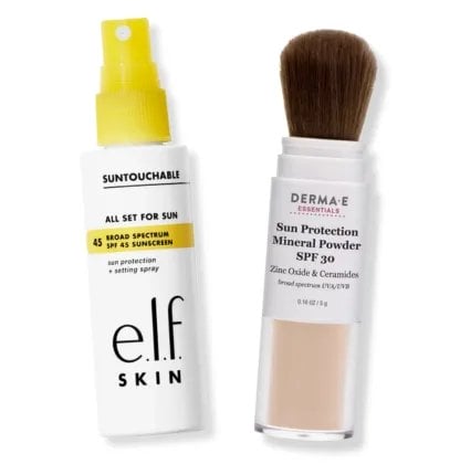 Bottle of e.l.f. All Set for Sun SPF Setting spray and tube of Derma E Sun Protection SPF Powder | Slashed Beauty