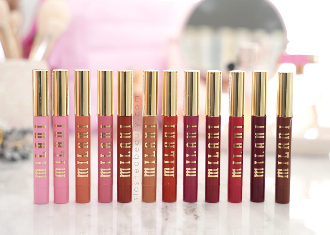 milani-plumping-balms | Slashed Beauty Milani Keep It Full Glossy Plumping Balms lined up side by side on marble vanity | Milani Keep It Full Glossy Plumping Balms Review & Swatches | Slashed Beauty